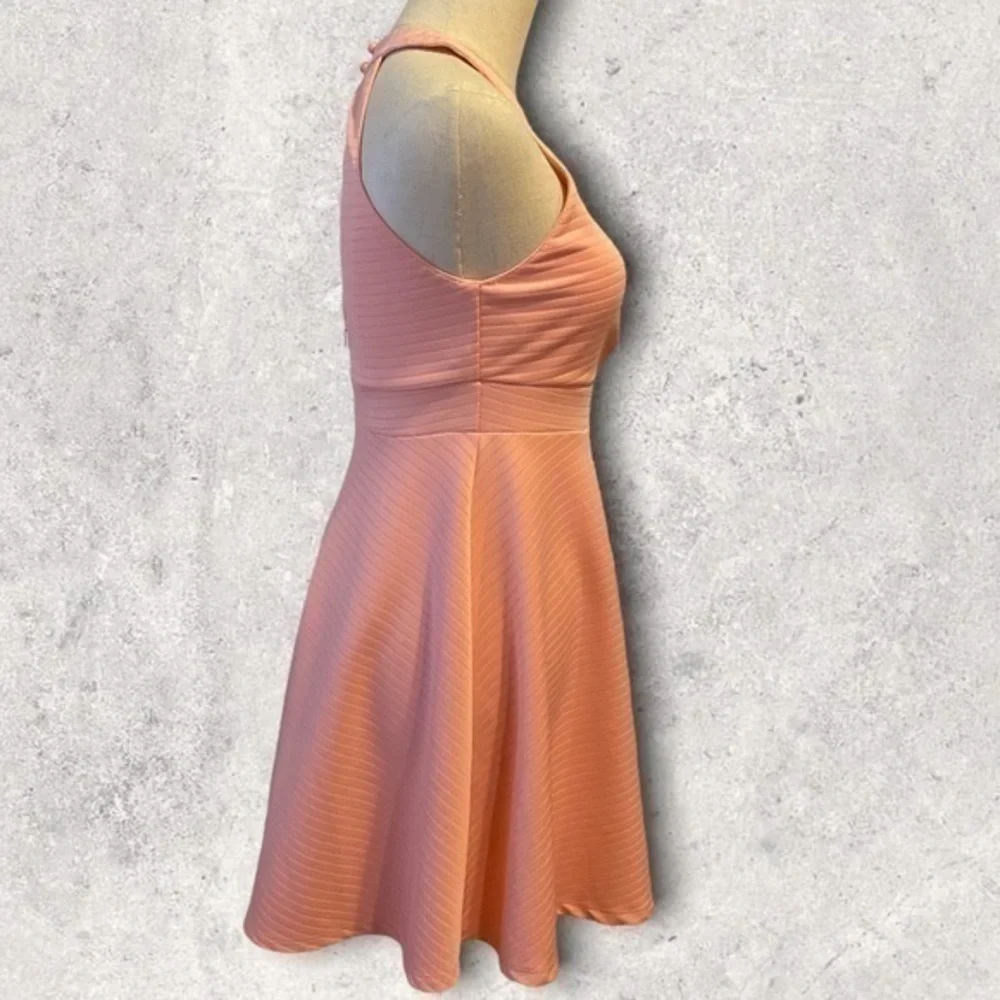 •Altar’d State• Light pink sleeveless‎ dress with partially open back